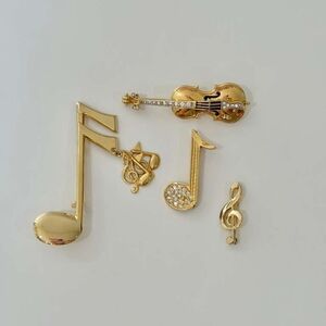 Violin And Musical Note Brooches In Gold Tone 4items.  34.7gr.